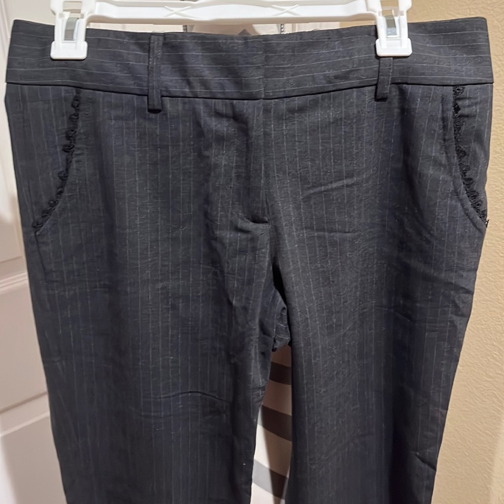 Dark grey trousers